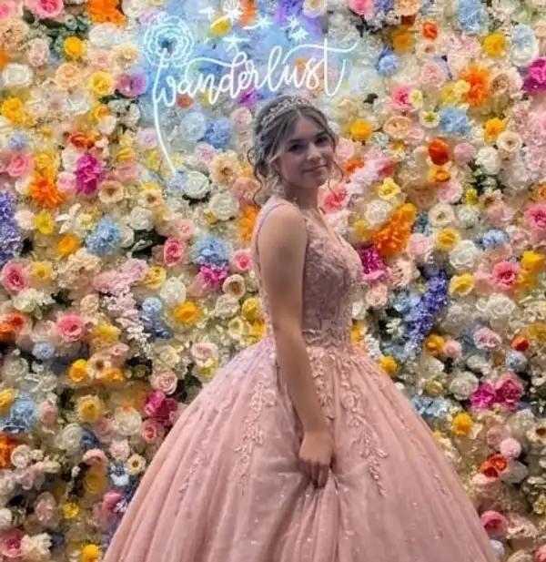 Quinceañera flower wall photo backdrop at Wanderlust Las Vegas event venue